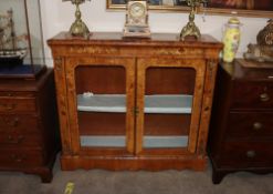 A 19th Century walnut and marquetry inlaid china display cabinet, the interior shelf enclosed by a
