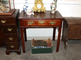 A George III mahogany side table, fitted with single drawer and raised on square chamfered supports,