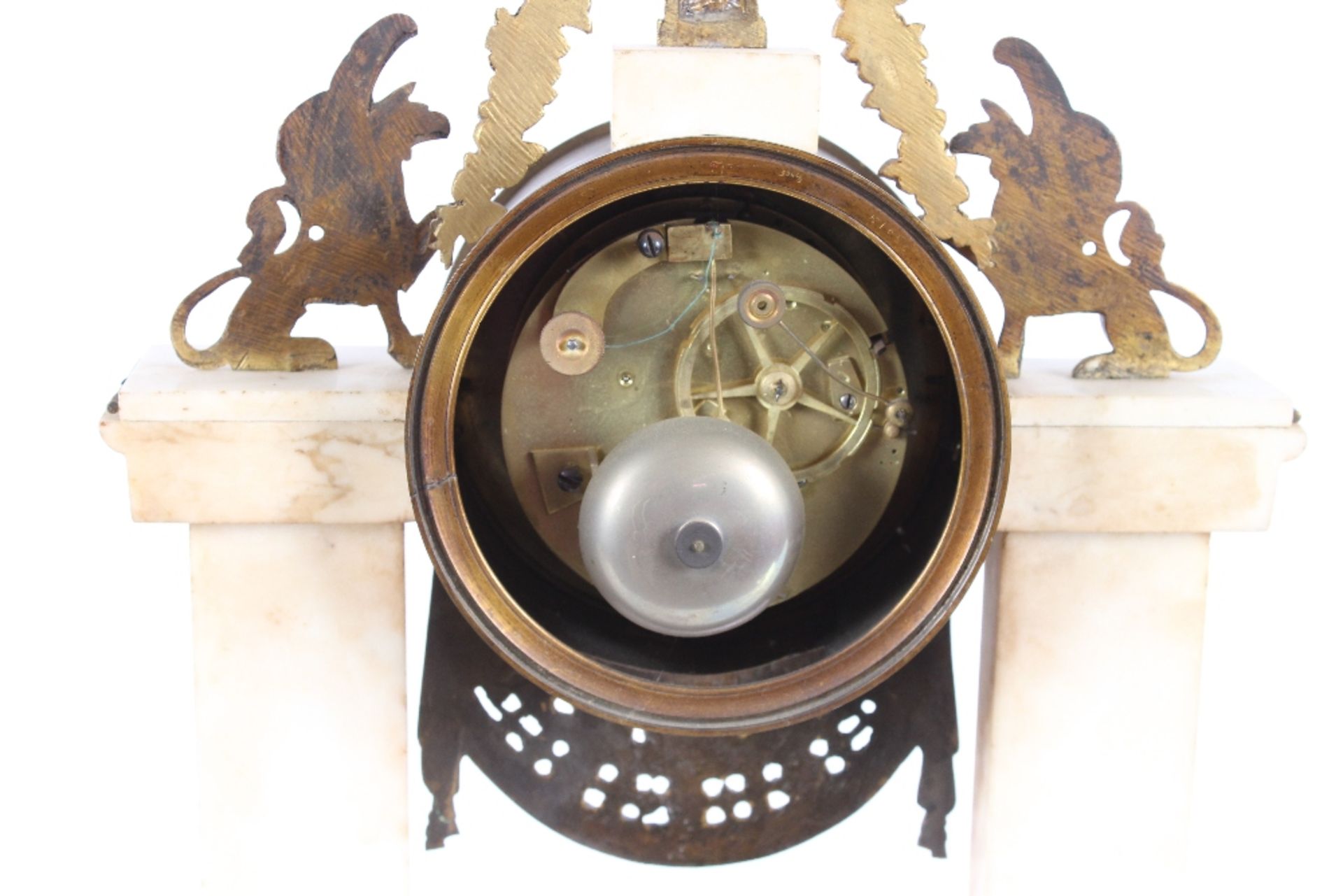 A 19th Century French marble and ormolu mounted mantel clock, surmounted by griffins and garlands, - Image 5 of 6