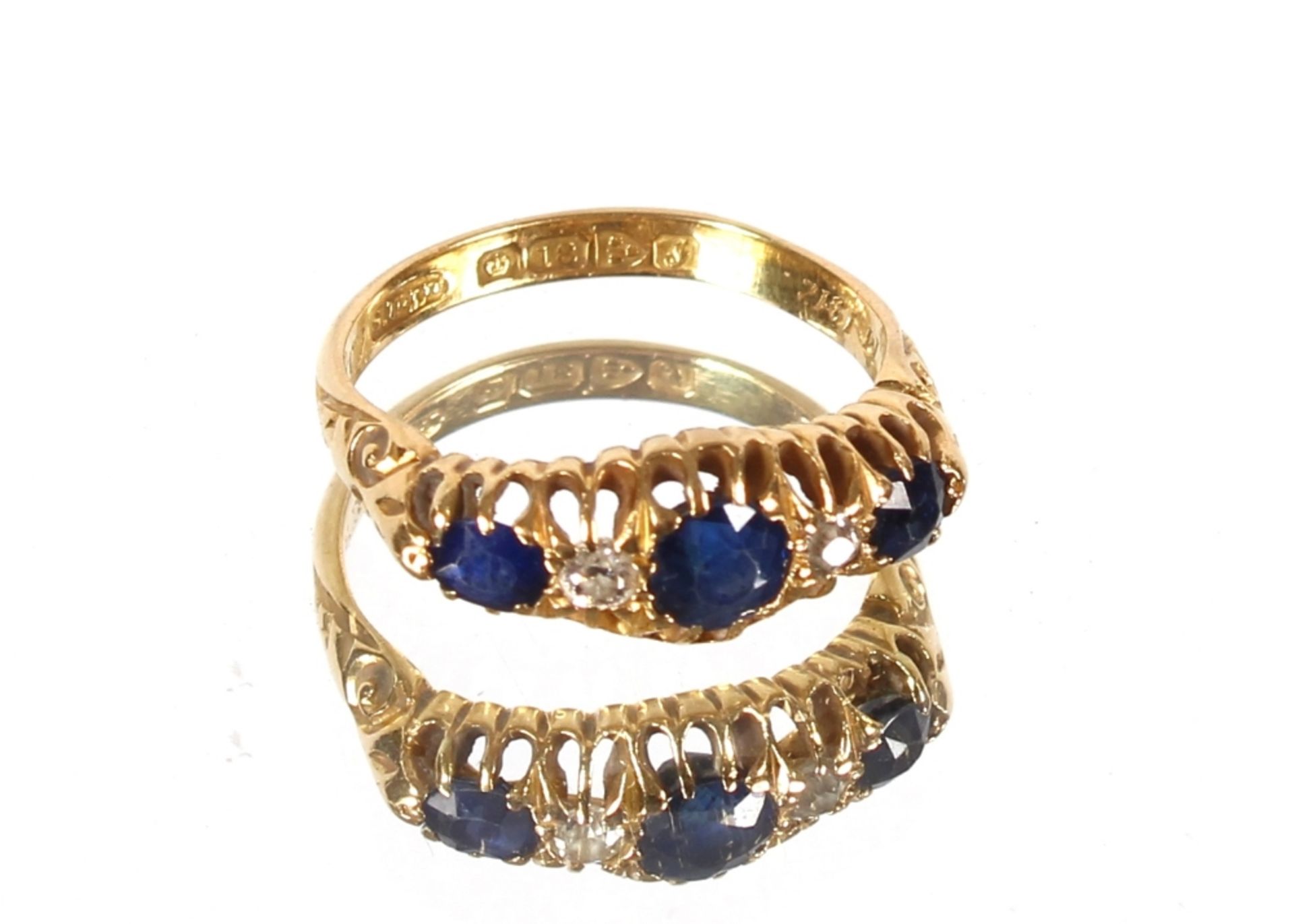 A 18ct gold sapphire and diamond five stone ring, size L, total weight approx. 3.8gms