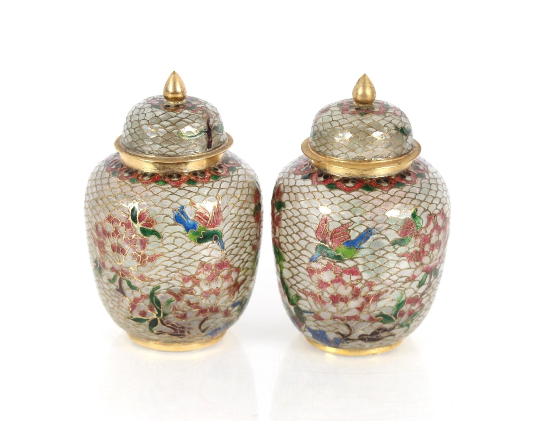 A matching pair of glass cloisonné Plique-a-Jour lidded lars, 11cms