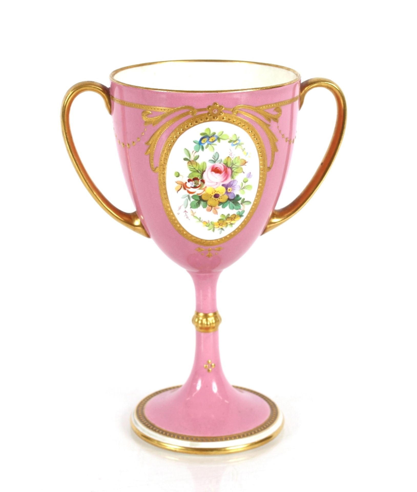 A 19th Century Minton's baluster cup, decorated with a finely painted foliate panel within gilt