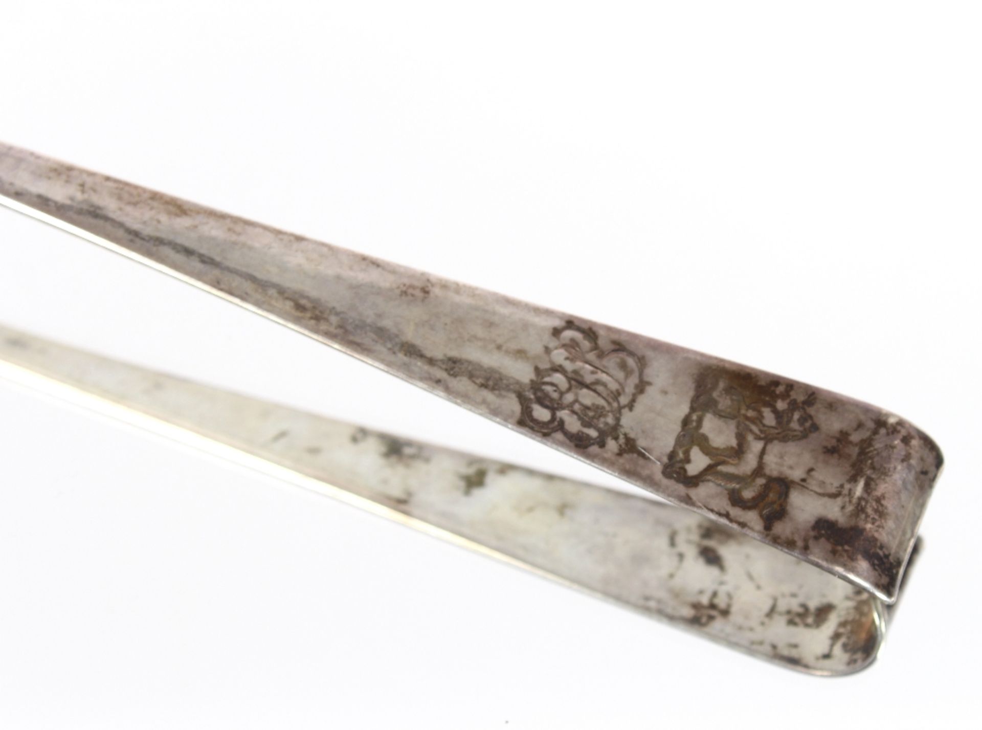 A George III silver soup ladle, with scroll handle decorated monogram and family crest marks - Image 2 of 3