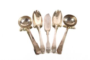 A George III silver sauce ladle, London 1806; a later similar; two 18th Century silver table spoons,