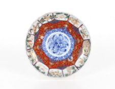 A pair of Imari scallop bordered dishes, decorated signs of the Zodiac around a central leaf