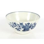 An 18th Century Royal Worcester bowl, decorated flowers and butterflies, under glazed blue