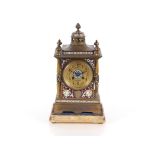 A 19th Century French gilded and champlevé enamel decorated mantel clock, the circular dial