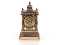 A 19th Century French gilded and champlevé enamel decorated mantel clock, the circular dial