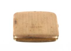 A George V 9ct gold cigarette case of curved form with engine turned decoration, Birmingham 1915,
