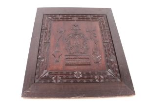 A large Chinese carved hardwood panel, decorated flowers and vases within a stylised border, 116cm x