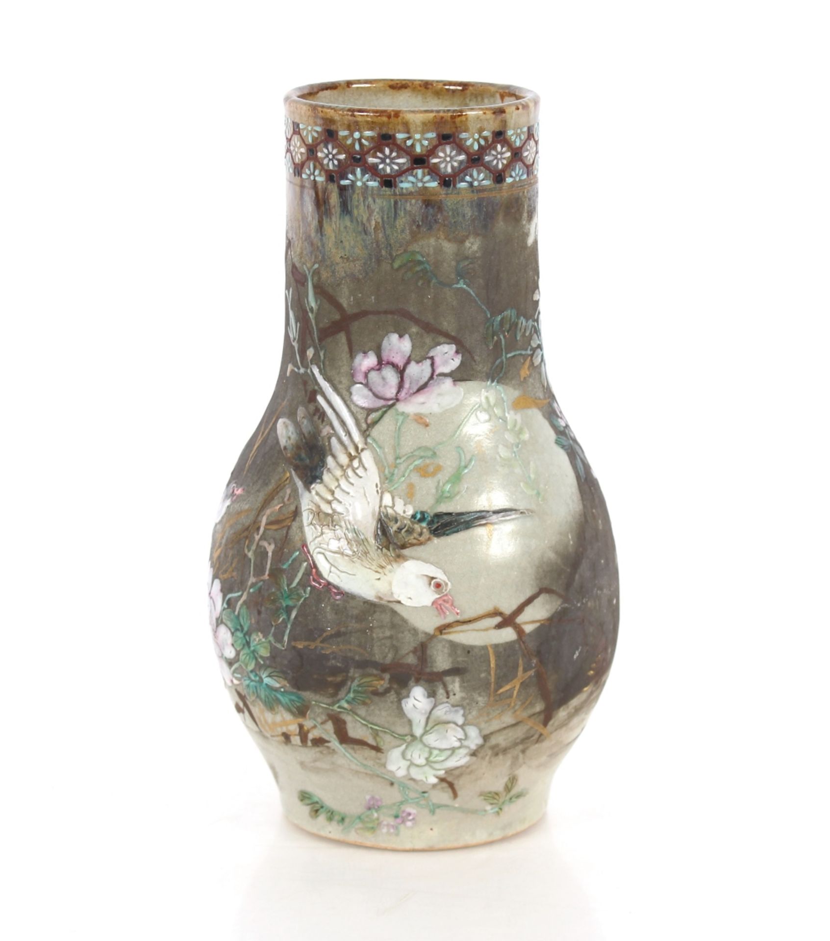 A Japanese pottery vase, decorated birds and foliage, 31cm high