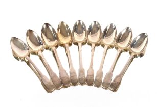 Five Victorian silver "Fiddle" pattern dessert spoons, London 1893; and four various George III