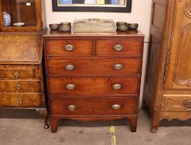 A 19th Century mahogany chest of two short and three long drawers, cut in two sections raised on a