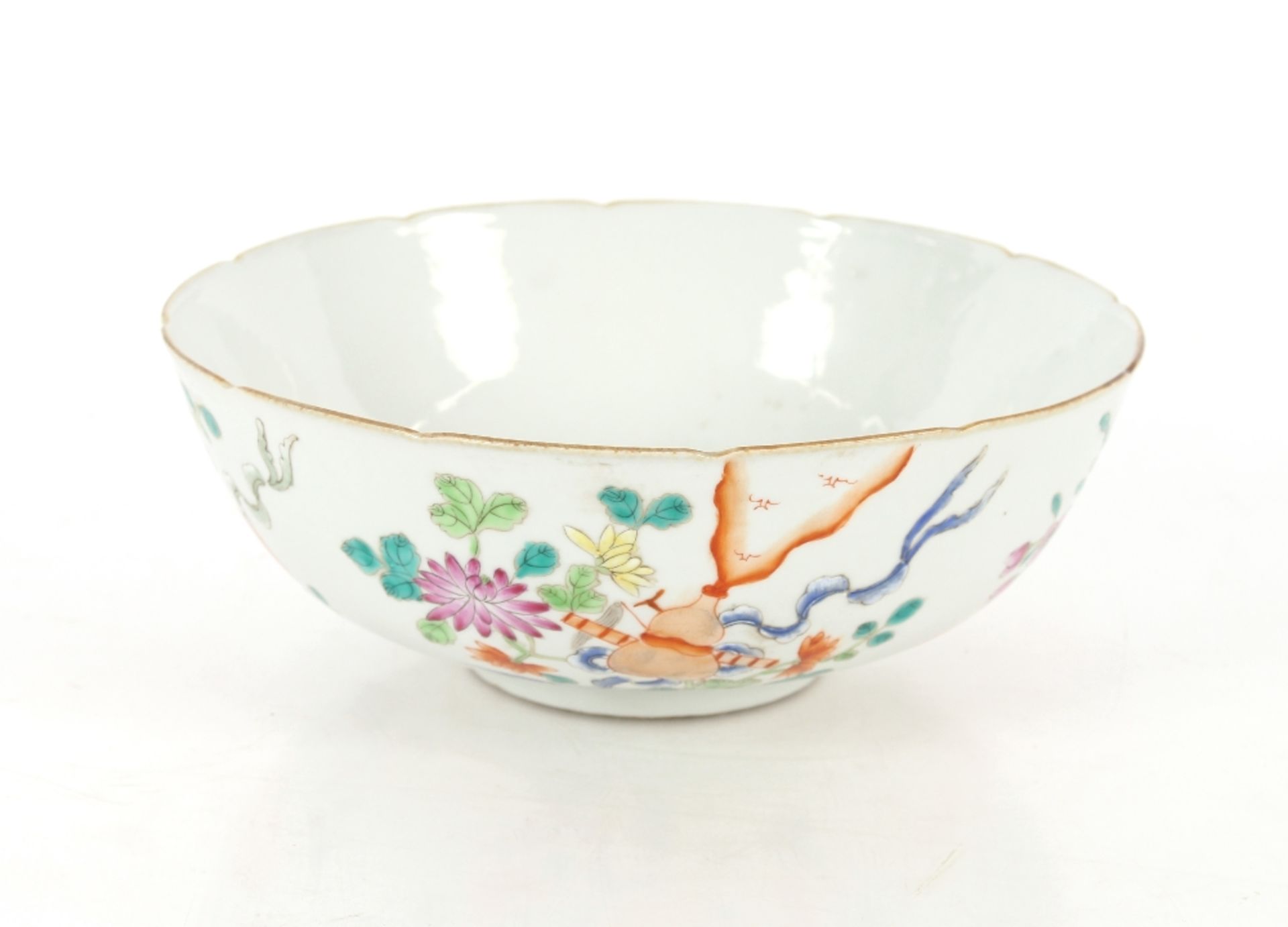 A Chinese Famille Rose bowl, six character mark to base with old paper label dated 1921