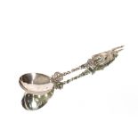 An Edwardian silver fancy spoon, the pierced terminal surmounted by a figure of Alfred The Great,