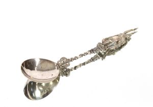 An Edwardian silver fancy spoon, the pierced terminal surmounted by a figure of Alfred The Great,