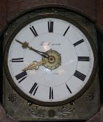 A tall French oak long case clock, having circular enamel Roman numeral dial, the case of waisted