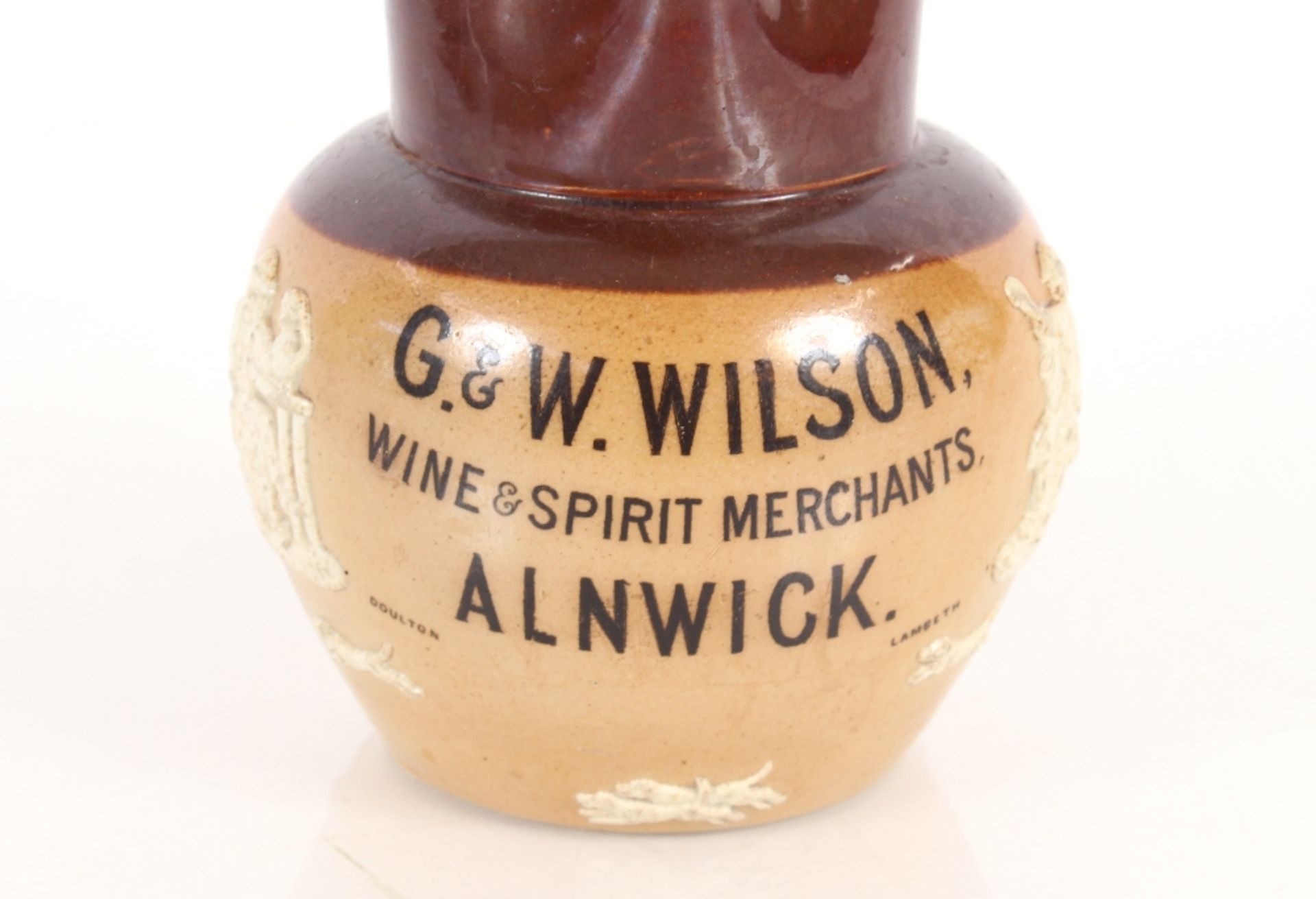 A Doulton Harvest ware baluster jug, inscribed G. & W. Wilson Wine and Spirit Merchants Alnwick, - Image 2 of 4