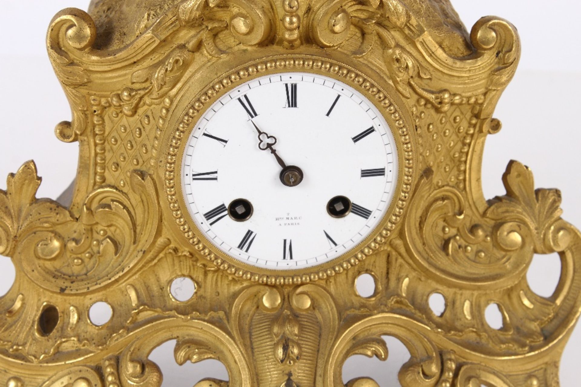 A 19th Century French gilt mantel clock, the case surmounted by a seated figure, circular white - Image 2 of 5