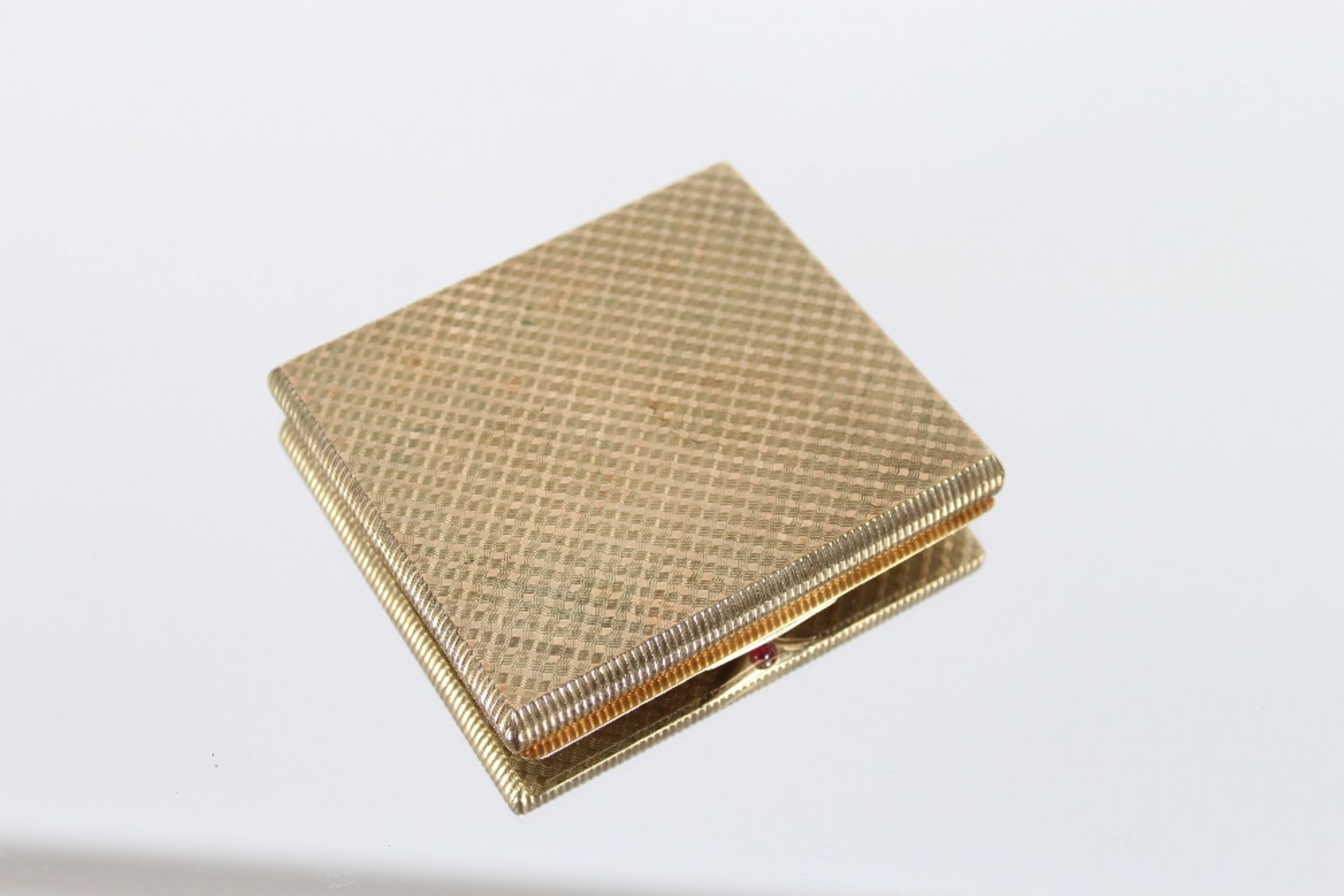 A 9ct gold Asprey cigarette case, 1960's,  with engine turned decoration, the clasp with ruby - Image 4 of 4