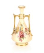 A Royal Worcester vase, having painted foliate spray decoration on a blush ivory ground, flanked