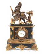 A 19th Century French black marble and Ormolu mounted mantel clock, surmounted by a seated bronze