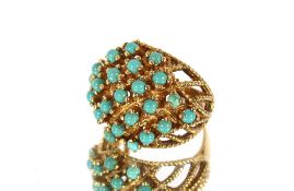 A 9ct gold and turquoise ring, 6gms total weight, ring size L