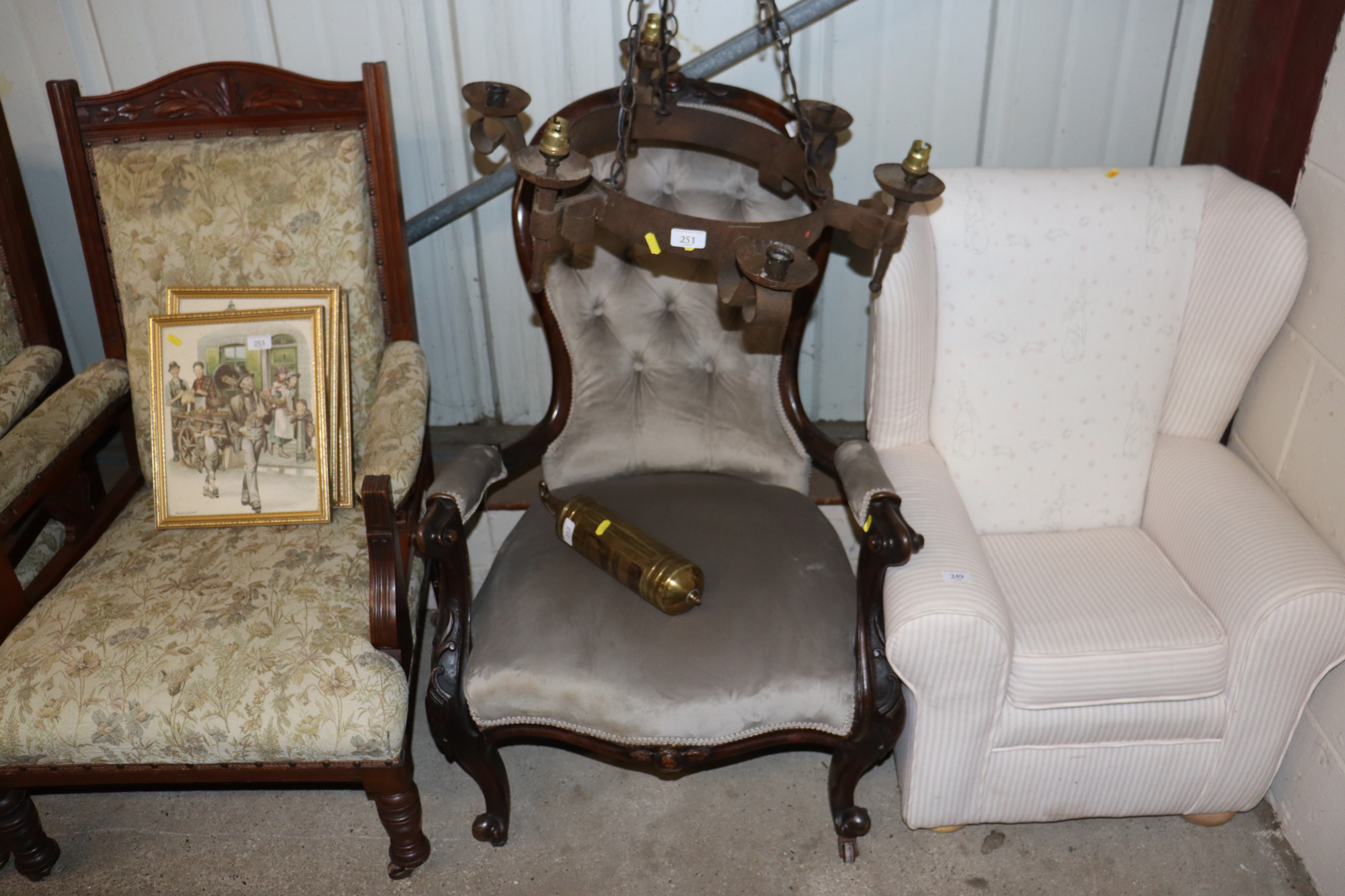 A Victorian spoon back armchair