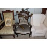 A Victorian spoon back armchair