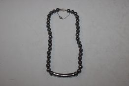 A titanium bead necklace