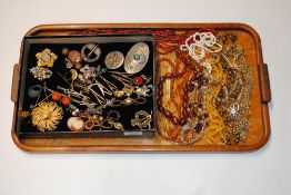 A box and tray containing vintage and other costum