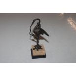 A bronze sculpture in the form of a crane with snake standing on a turtle, 21cm high