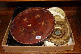 A box containing four Florentine gilt trays, papie