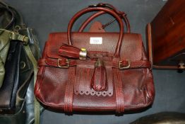 A Luella ladies red handbag