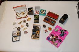 A box and contents of assorted costume jewellery