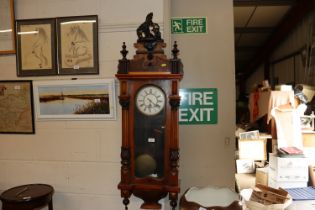 A walnut cased Vienna regulator wall clock