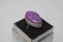 A 925 silver and purple hardstone set ring