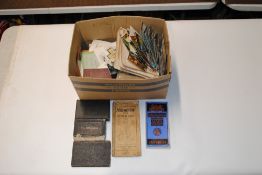 A box of post-cards and Ordnance Survey maps