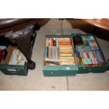 Three boxes of various books to include boxed sets