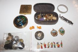 A box containing compacts, cuff-links, buttons, wh
