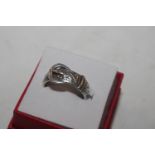 An antique silver buckle ring, ring size N/O