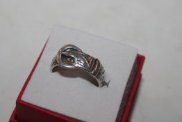 An antique silver buckle ring, ring size N/O