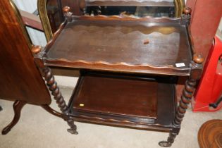 An oak barley twist two tier tea trolley and a fol