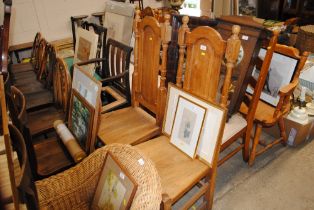 A pair of oak dining chairs