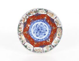 A pair of Imari scallop border dishes decorated si