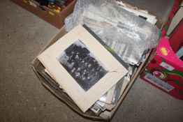 A box of miscellaneous vintage photographs