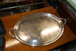 A large oval electroplated two handled tea tray