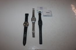 A Seiko 5 wrist watch; a Casio wrist watch and a L
