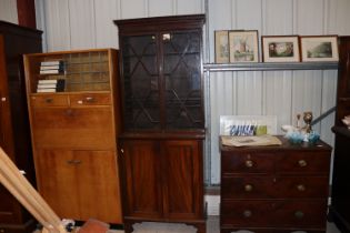 A Regency mahogany astragal glazed bookcase on cup