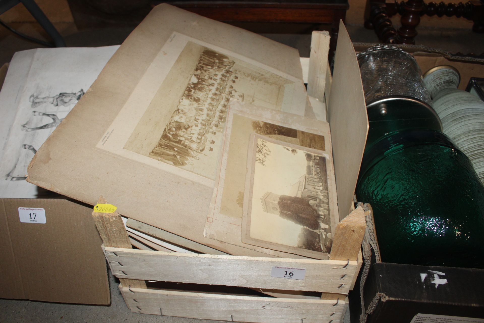 A box of various vintage photos